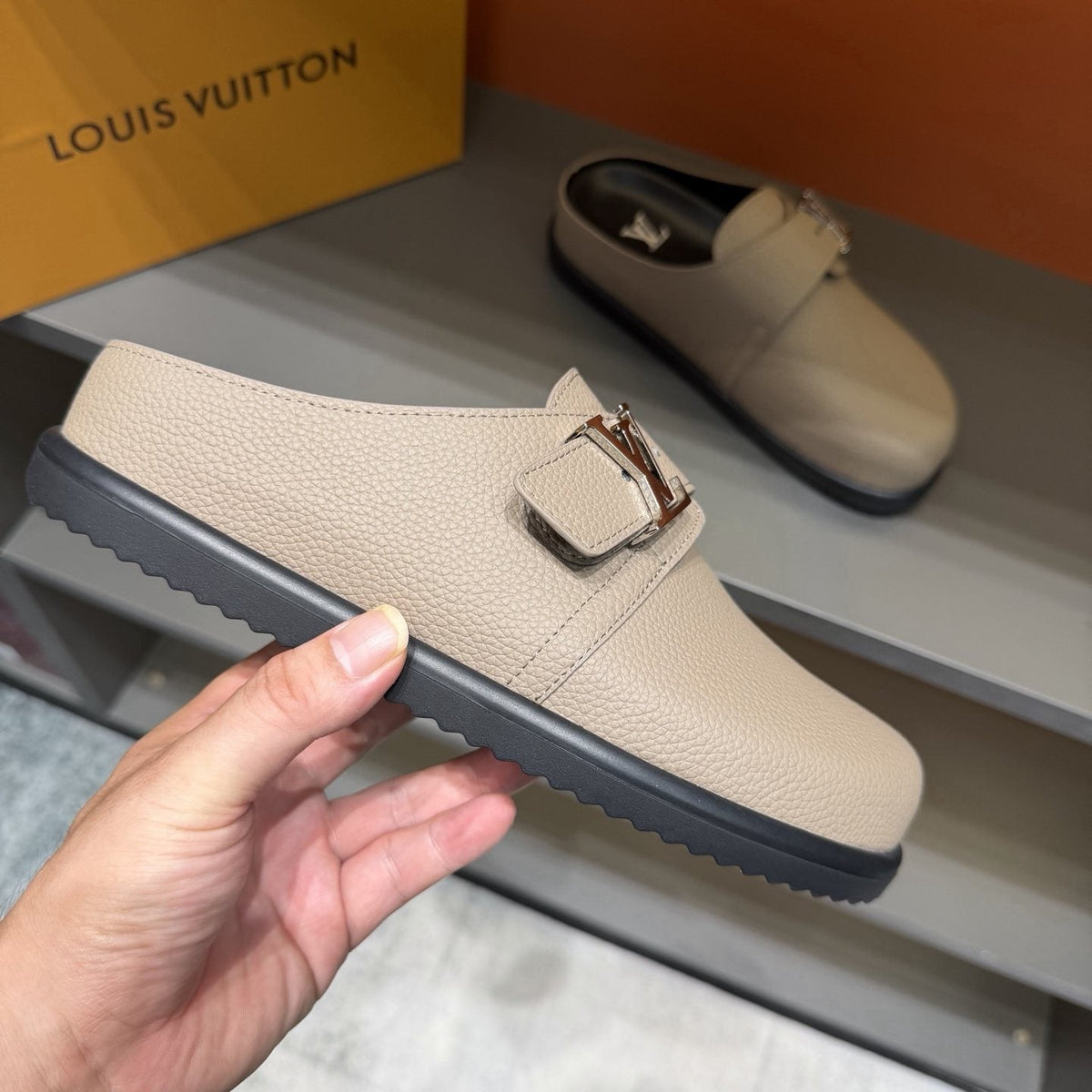 Louis Vuitton Textured Buckle Slide Sandals — side