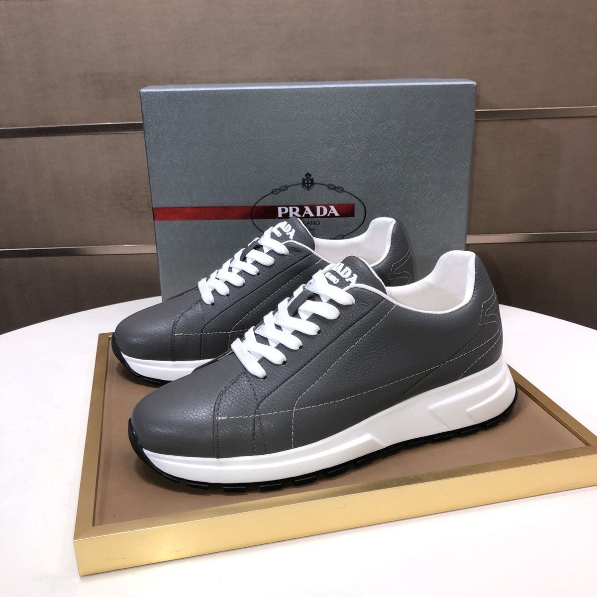 PRADA Black Quilted Low-Top Sneakers — front