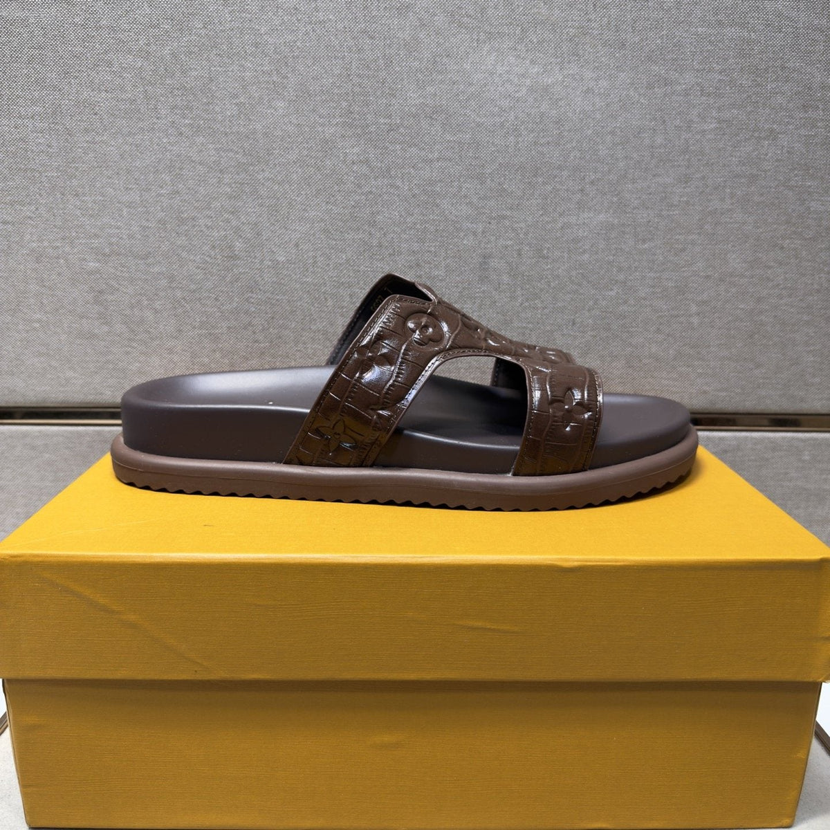 Louis Vuitton Textured Monogram Slide Sandals — front